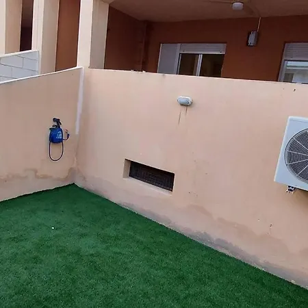 Bajo Con Patio, Piscina Y Playa A 200 Metros Апартаменты